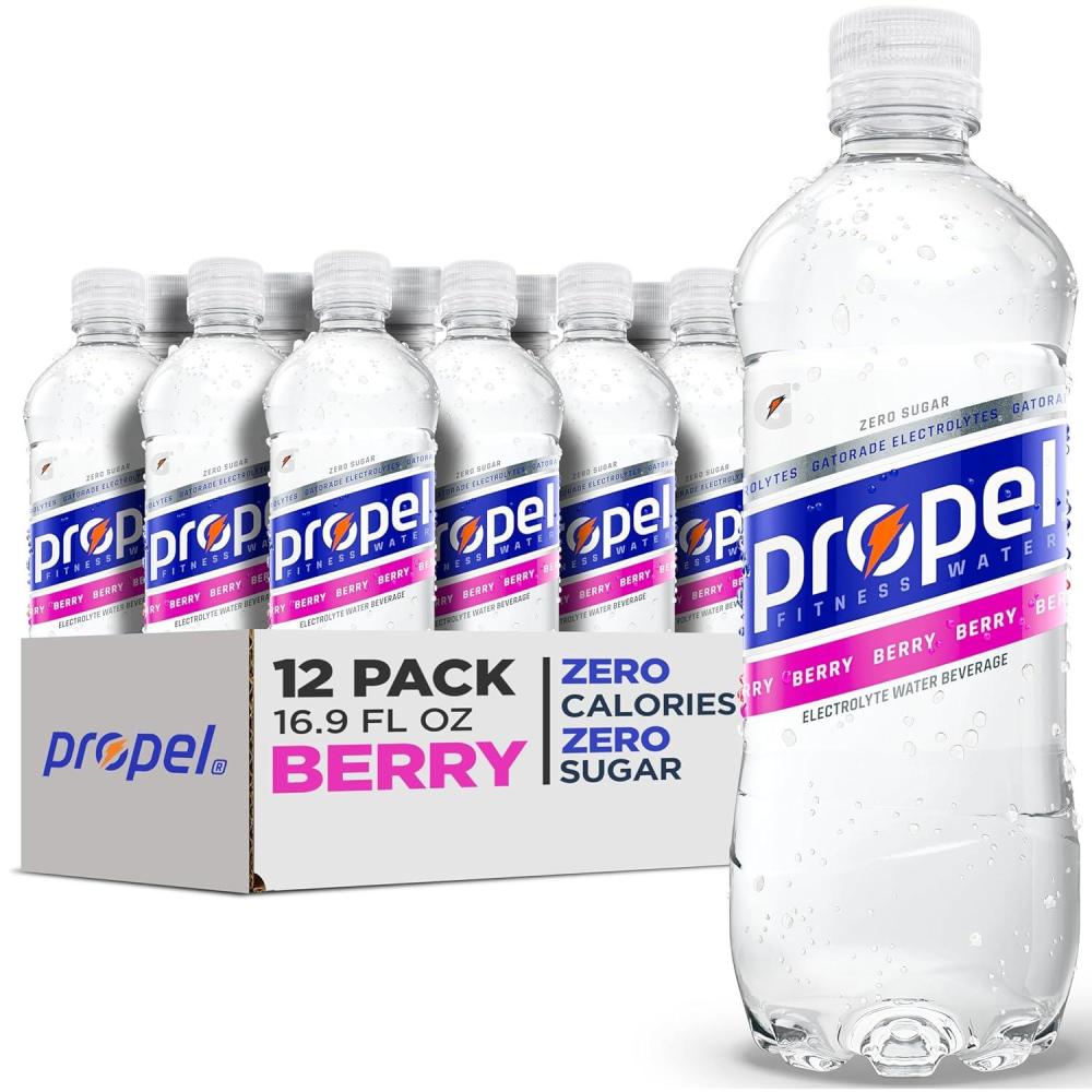 imagePropel Electrolyte Enhanced Water Sports Drink Strawberry Lemonade Flavored Water Zero Calorie ampamp Zero Sugar Hydration with Electrolytes and Vitamins C ampamp E 169 fl oz Water Bottles 12 PackBerry