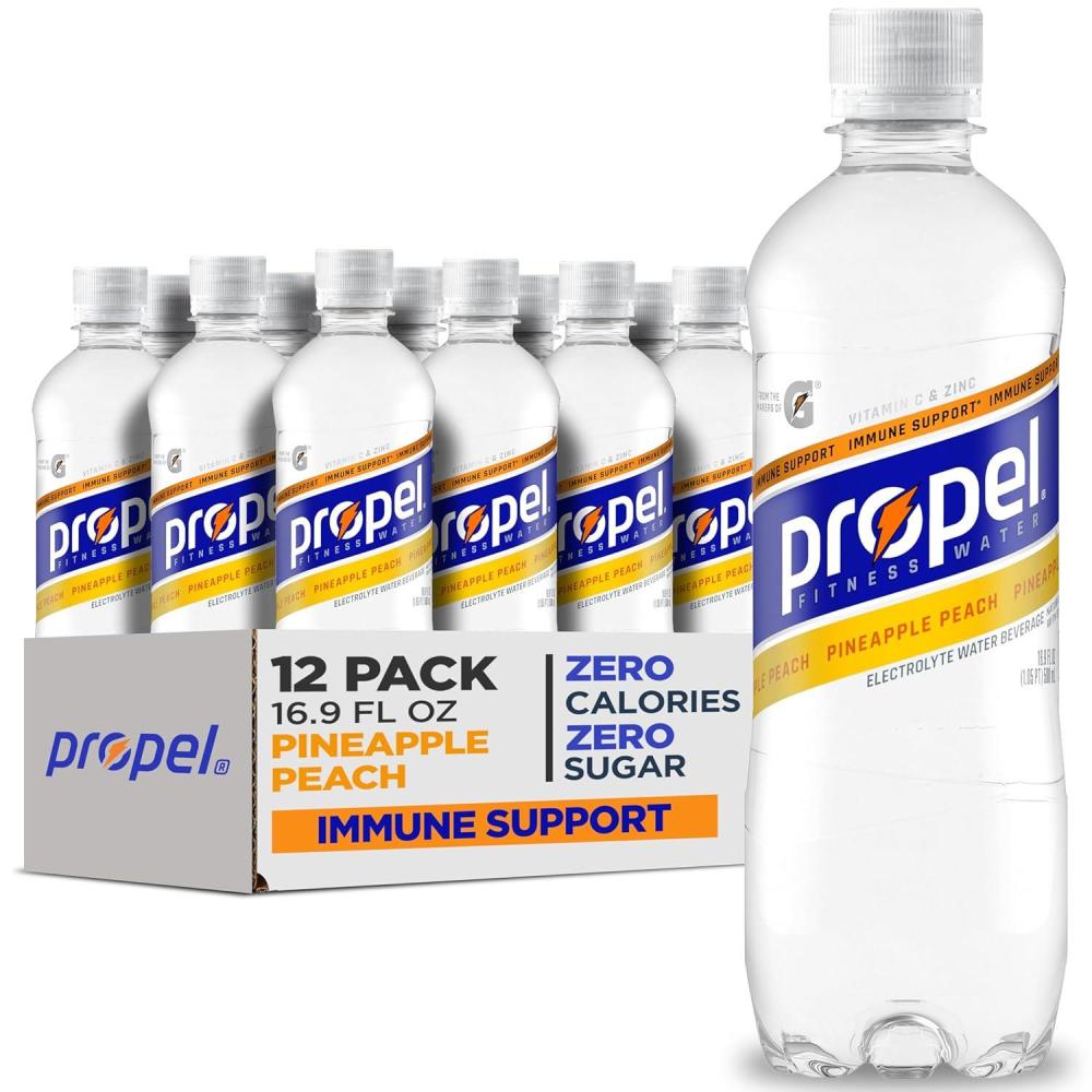 imagePropel Immune Support Electrolyte Enhanced Water Sports Drink Orange Raspberry Flavored Water 100 DV Vitamin C Zinc Zero Calorie ampamp Zero Sugar Hydration with Electrolytes and Vitamins 169 fl oz Water Bottles 12 PackPineapple Peach